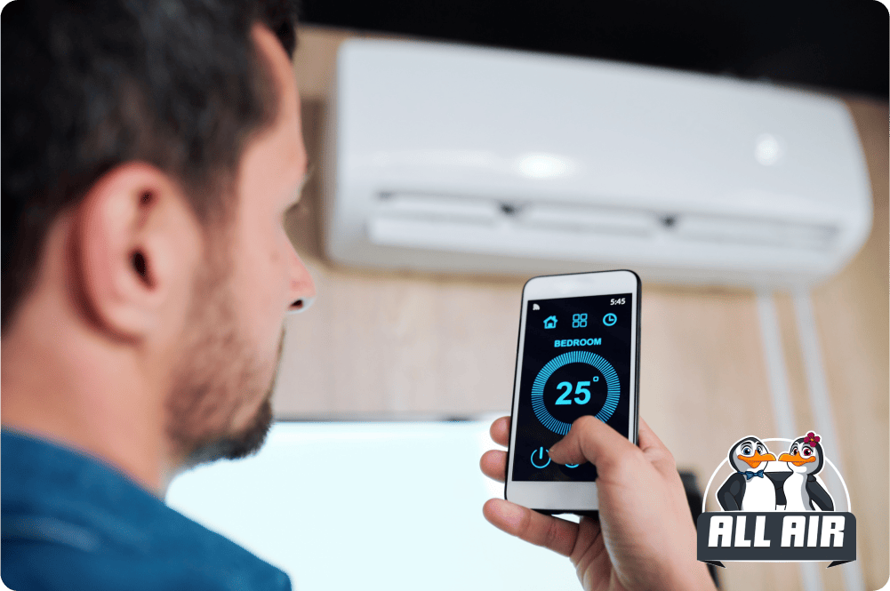 A man controlling an HVAC system using his smartphone with AI-powered automation.